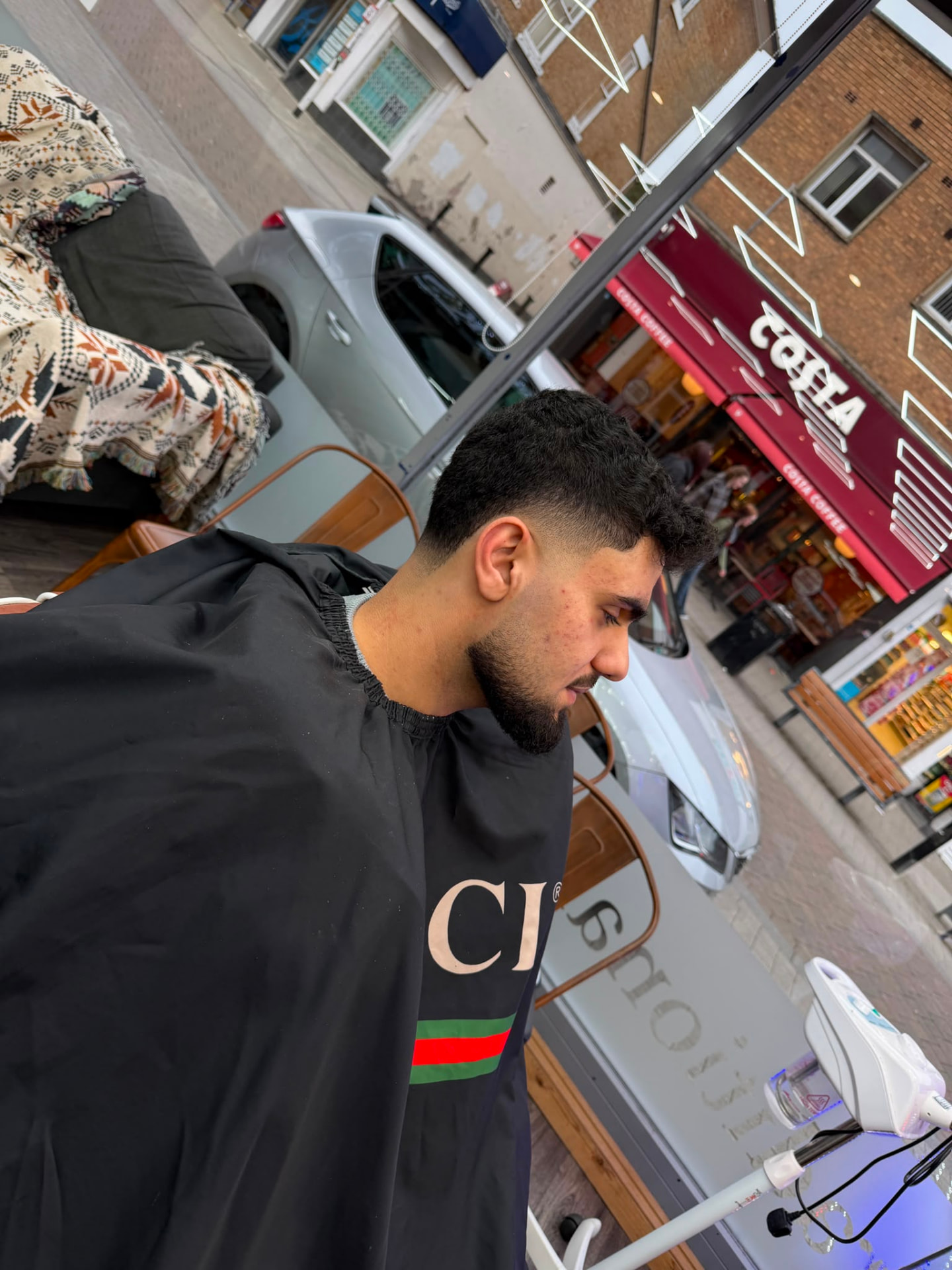 Curly top with tight fade