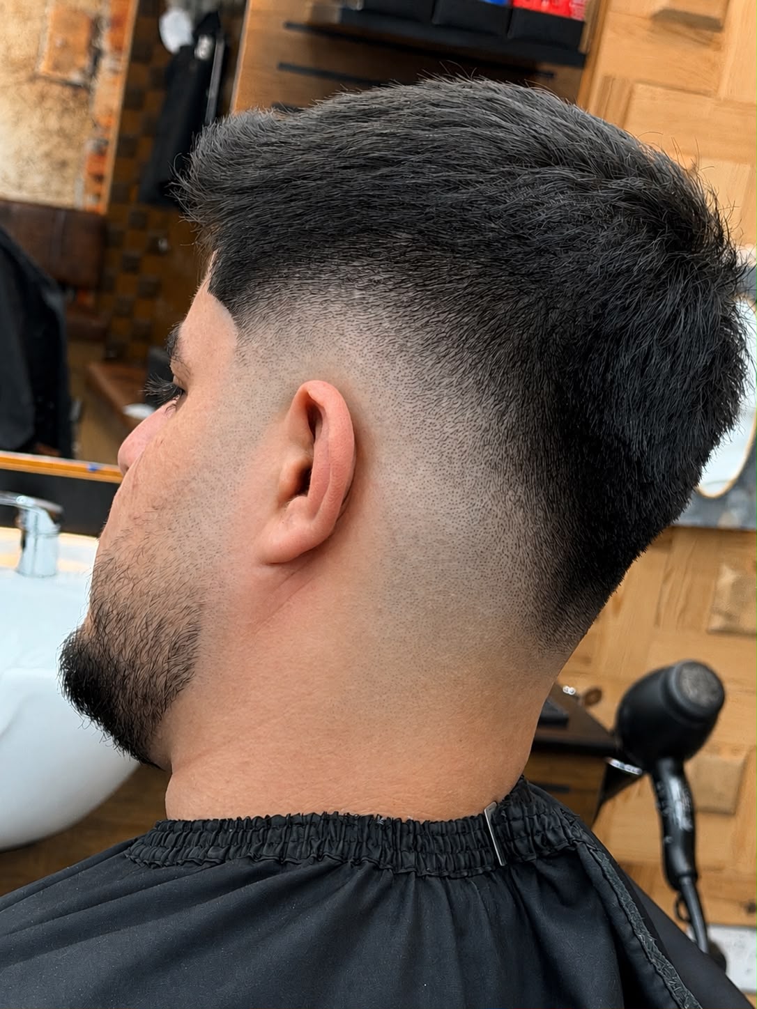 Fresh mid skin fade with textured top