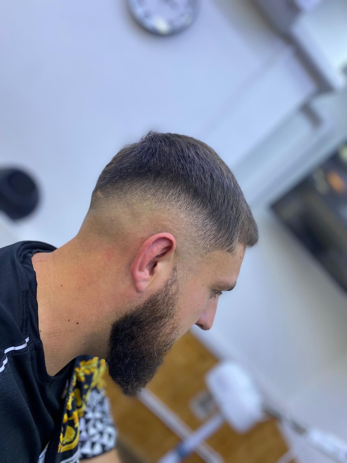 High skin fade with full beard blend